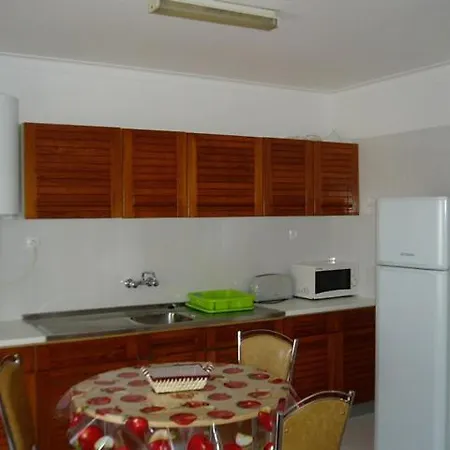 Апартаменты Apartamento Na 1.o Linha Da Da Rocha Портиман